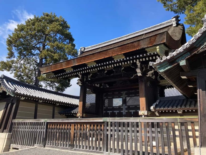 Kyoto: Nijo Castle and Kyoto Imperial Palace Guided Tour - The walk between sites: street-level Kyoto, townhouses, and a cherry blossom stop