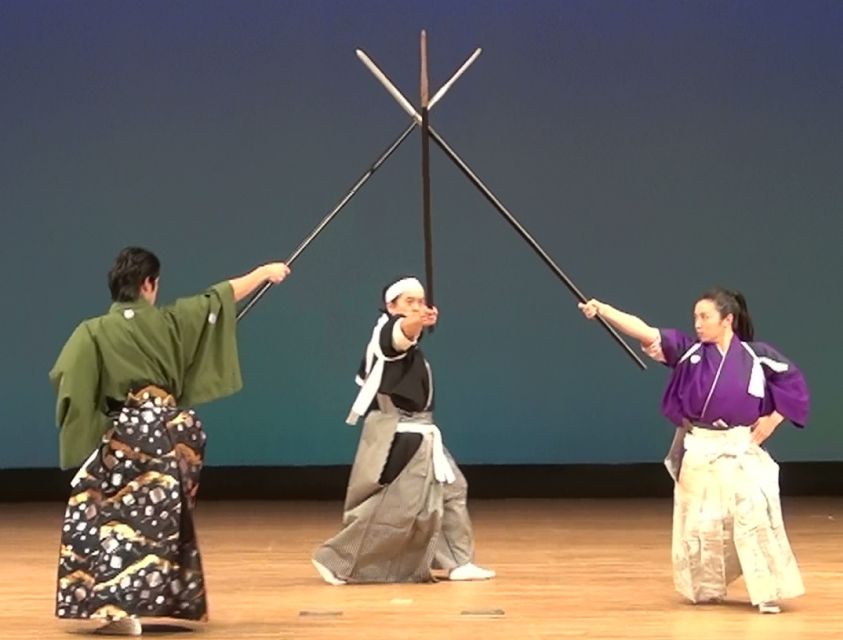 Kyoto: Samurai Kenbu Traditional Sword Dancing Show - The mini sword lesson: drawing a scabbard and controlled swings